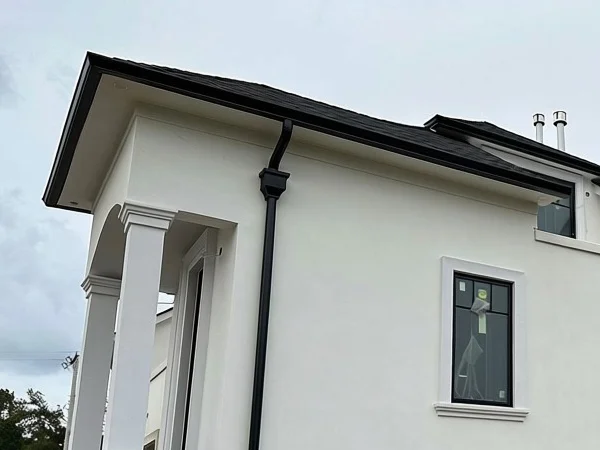 New black gutter system on home